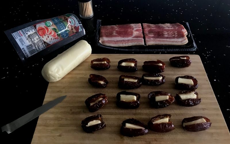 This Stuffed Bacon Wrapped Dates recipe is a crowd favorite at any gathering. Stuffed with delicious Mozzarella cheese, you will be the talk of the town!